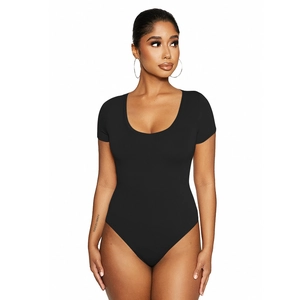 Close-up of a black short sleeve bodysuit with a deep U-neckline on a female model