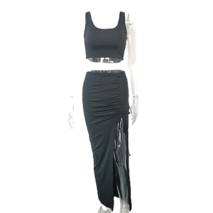 Women's black crop top and drawstring side slit maxi skirt two-piece bodycon set