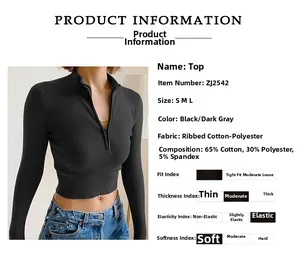 Detail of ribbed long sleeve top with half-zipper and fabric composition details