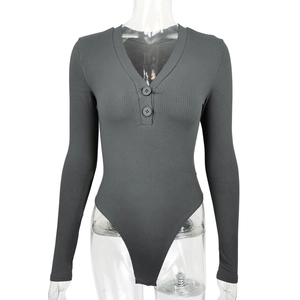 Close-up of V-neck ribbed fabric with buttons on long sleeve dark grey bodysuit