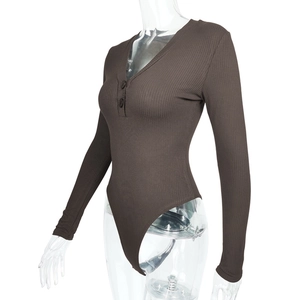 Close-up of ribbed knit texture on deep brown V-neck long sleeve bodysuit for women