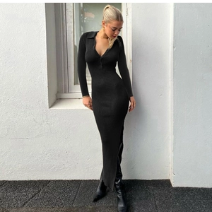 Slim fit black ribbed knit polo maxi dress with long sleeves and side slit design