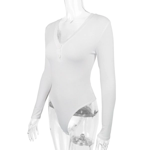 Detail of ribbed knit bodysuit with V-neck buttons and long sleeves in white