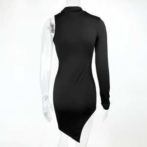 Detail of black one-shoulder mini dress with asymmetrical hem and elastic texture
