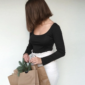 Slim fit black long sleeve cropped T-shirt with square neck on model against white background