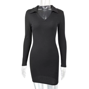 Detail of black rib-knit bodycon dress featuring a polo collar and deep V-neckline