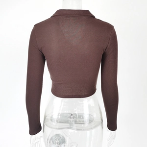 Close-up of the back view showing the slim fit ribbed texture and polo collar of the top