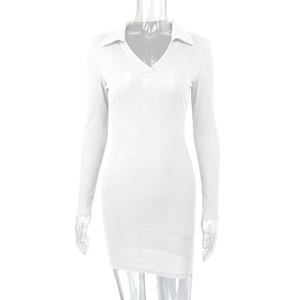 Close-up of white ribbed knit dress featuring a V-neckline and classic collar detail