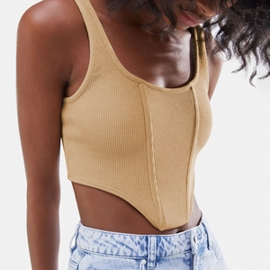 Slim fit tan ribbed knit corset tank top with pointed hem and bone-like structure