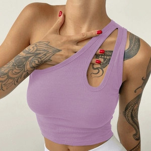 Detail of purple one-shoulder ribbed crop top with stylish teardrop cutout and textured fabric
