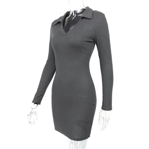 Detailed knit texture of dark grey long sleeve polo dress with ribbed pattern