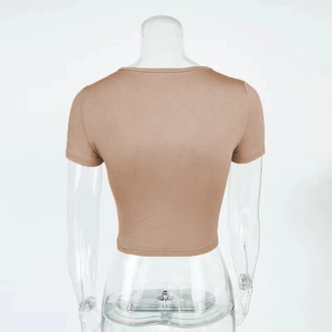 Rear view of slim fit U-neck crop top with fine vertical ribbed texture in light brown