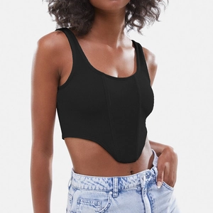 Slim fit black ribbed crop top with fishbone hem styled with denim jeans for a chic look