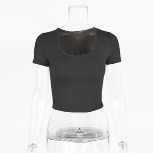 Detail view of the stitching and U-neckline on this slim black cropped T-shirt