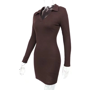 Close-up of ribbed knit texture and polo collar on dark brown bodycon dress