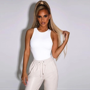 Detail of white sleeveless bodysuit paired with drawstring waist joggers on a model