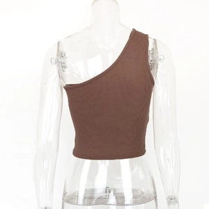 Detail of brown ribbed knit fabric texture on a slim fit one shoulder crop top