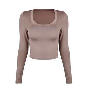 Slim fit long sleeve crop top with deep U-neck in dusty pink color on white background