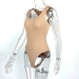Detailed view of the light brown ribbed knit fabric texture on this sleeveless U-neck bodysuit