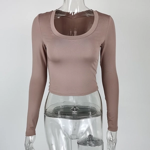 Detail of taupe slim fit U-neck long sleeve cropped top with high elastic ribbed knit fabric