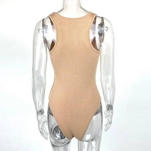 Detail view of the ribbed knit fabric and racerback design on the nude bodysuit