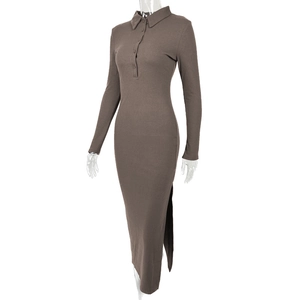 Detail of brown ribbed knit dress showing the side slit and fine fabric texture