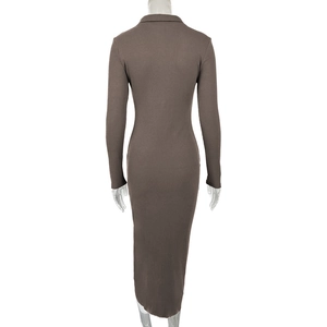 Detail view of the brown ribbed knit fabric and slim fit back of the polo maxi dress