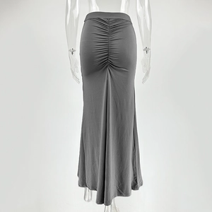 Macro shot of dark grey ruched back seam on a slim fit maxi skirt for women