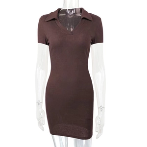 Detail of deep brown ribbed fabric and polo collar V-neckline on a slim fit mini dress