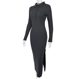 Detail of dark gray ribbed knit dress featuring polo collar and side slit hem design