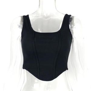 Detailed stitching and ribbed texture on a black boned corset-style crop top