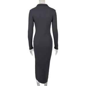 Detail view of dark grey ribbed knit maxi dress featuring a slim fit and polo collar design