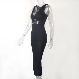Detail view of black ribbed knit midi dress with waist cutout and sleek V-neckline