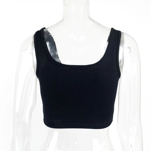 Detail showing black ribbed crop top texture and u-neck sleeveless design on mannequin