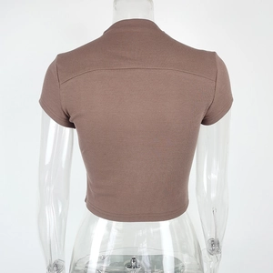 Detail of coffee brown ribbed knit fabric and stitching on a slim fit crop top t-shirt