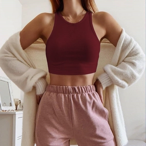 Detail of burgundy ribbed cotton tank top showing high-elastic texture and slim-fit crop cut