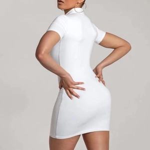 Short sleeve white ribbed bodycon mini dress showing slim fit silhouette on model