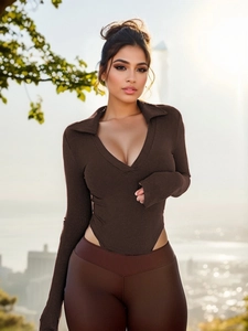 Close-up of the ribbed knit fabric and polo collar detail on this brown bodysuit