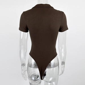 Detail view of the deep brown ribbed cotton fabric and sleek back cut of the bodysuit