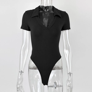 Close-up of black ribbed cotton bodysuit with polo collar and deep V-neckline detail