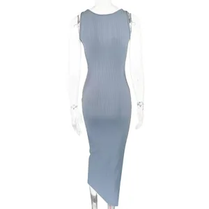 Back view of a dusty blue ribbed knit midi dress with a sleek slim fit silhouette