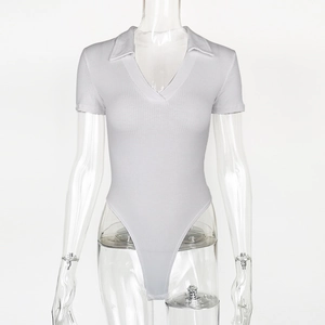 Detail of white ribbed knit bodysuit showing the polo collar and V-neckline texture