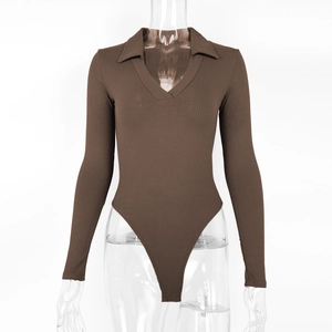 Close-up of ribbed knit texture on a chocolate brown long sleeve polo collar bodysuit