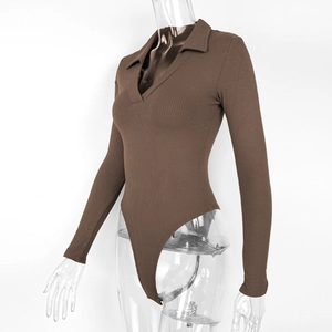 Detail view of the brown ribbed long sleeve bodysuit with polo collar and V-neckline