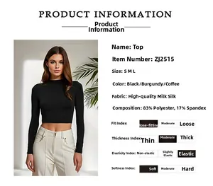 Détail du crop top noir à manches longues montrant la texture du tissu et les spécifications