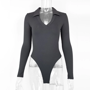 Detail of dark grey ribbed knit long sleeve bodysuit featuring polo collar and V-neckline