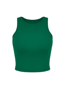 Detail of dark green ribbed crop top showing elastic knit texture and sleeveless cut