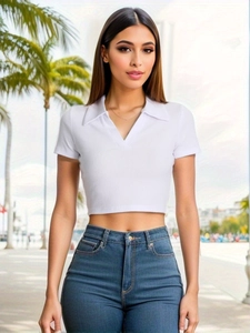 Slim fit white ribbed polo crop top for women in a summery outdoor setting