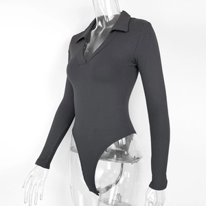 Detail of grey ribbed long sleeve bodysuit featuring a polo collar and V-neckline