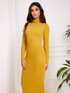 Detail of mustard yellow turtleneck dress with slim fit and elegant long sleeve texture